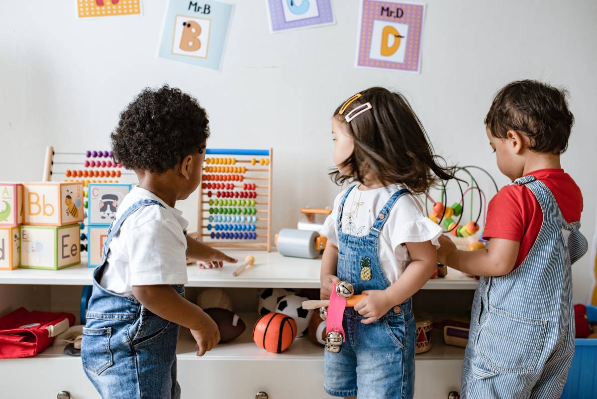 Young children playing with educational toys.